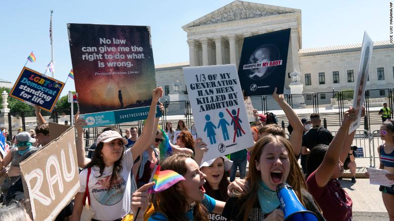 Anti-abortion demonstrators protest outside the Supreme Court in Washington, Saturday, June 25, 2022. The Supreme Court has ended constitutional protections for abortion that had been in place nearly 50 years, a decision by its conservative majority to overturn the court's landmark abortion cases. (AP Photo/Jose Luis Magana)